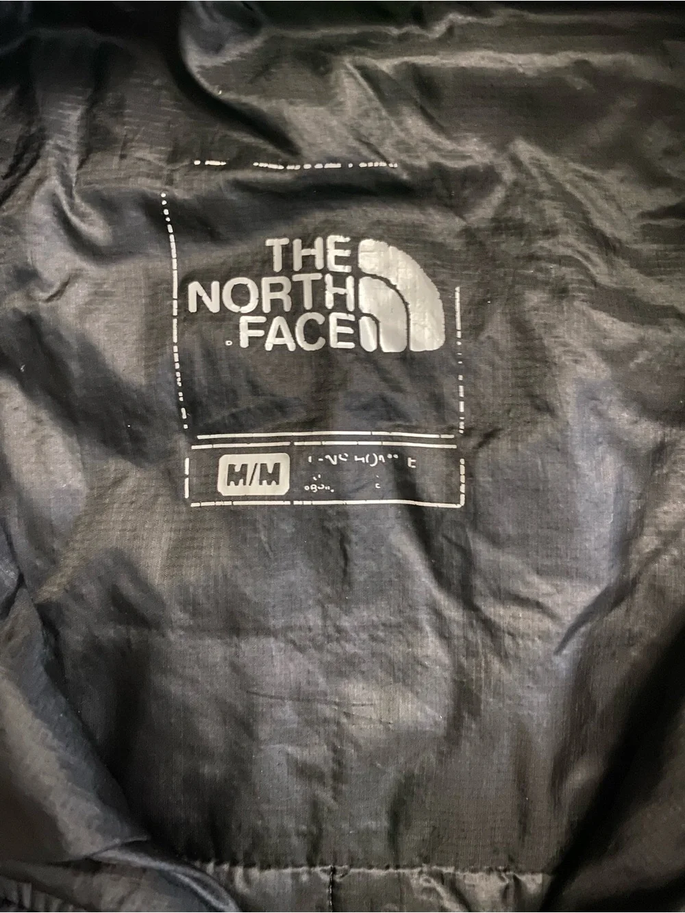 The North Face Black Quilted Puffer Jacket with Logo